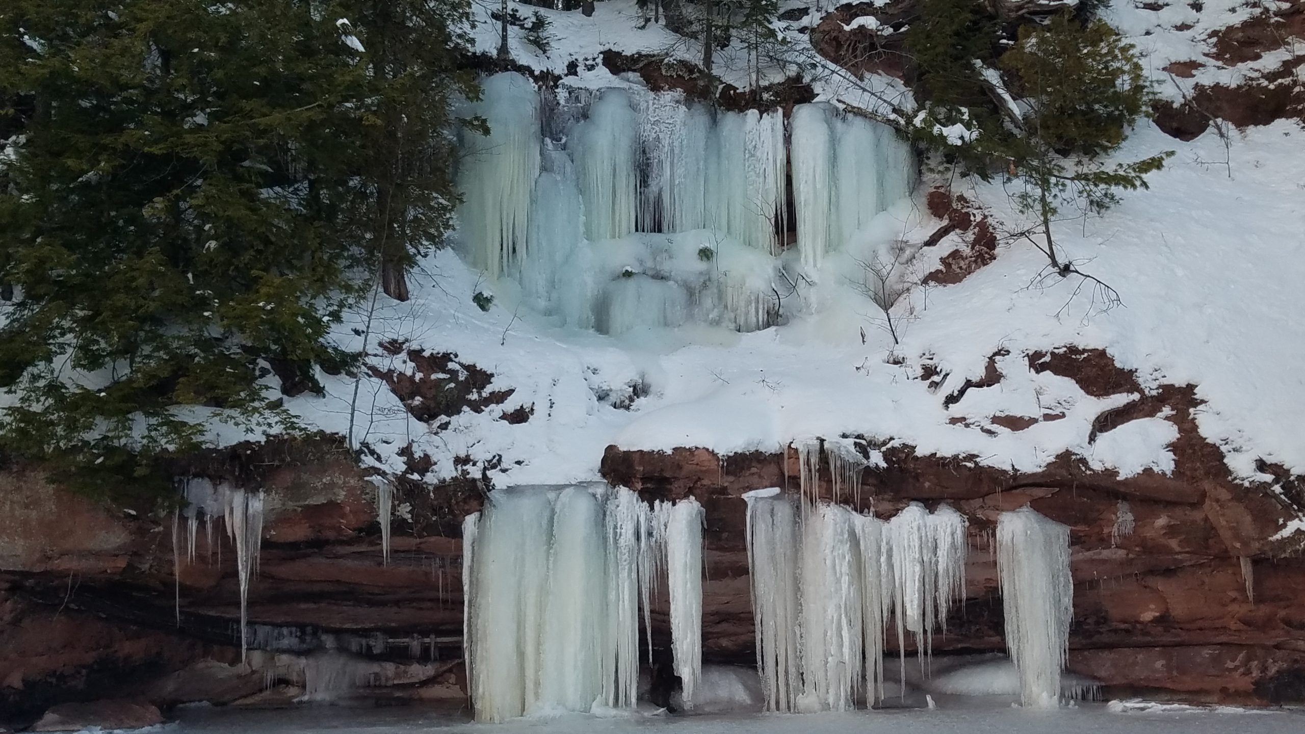 Spectacular blue ice formations of Apostle Islands sea caves during winter
