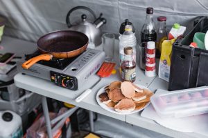 Create a Designated Outdoor Kitchen Zone for Extended Camping Stays